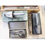 2 cased step cutters with cased No. 5 JR punch kit and adjustable reamer