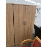 Light walnut effect two door cupboard, no key