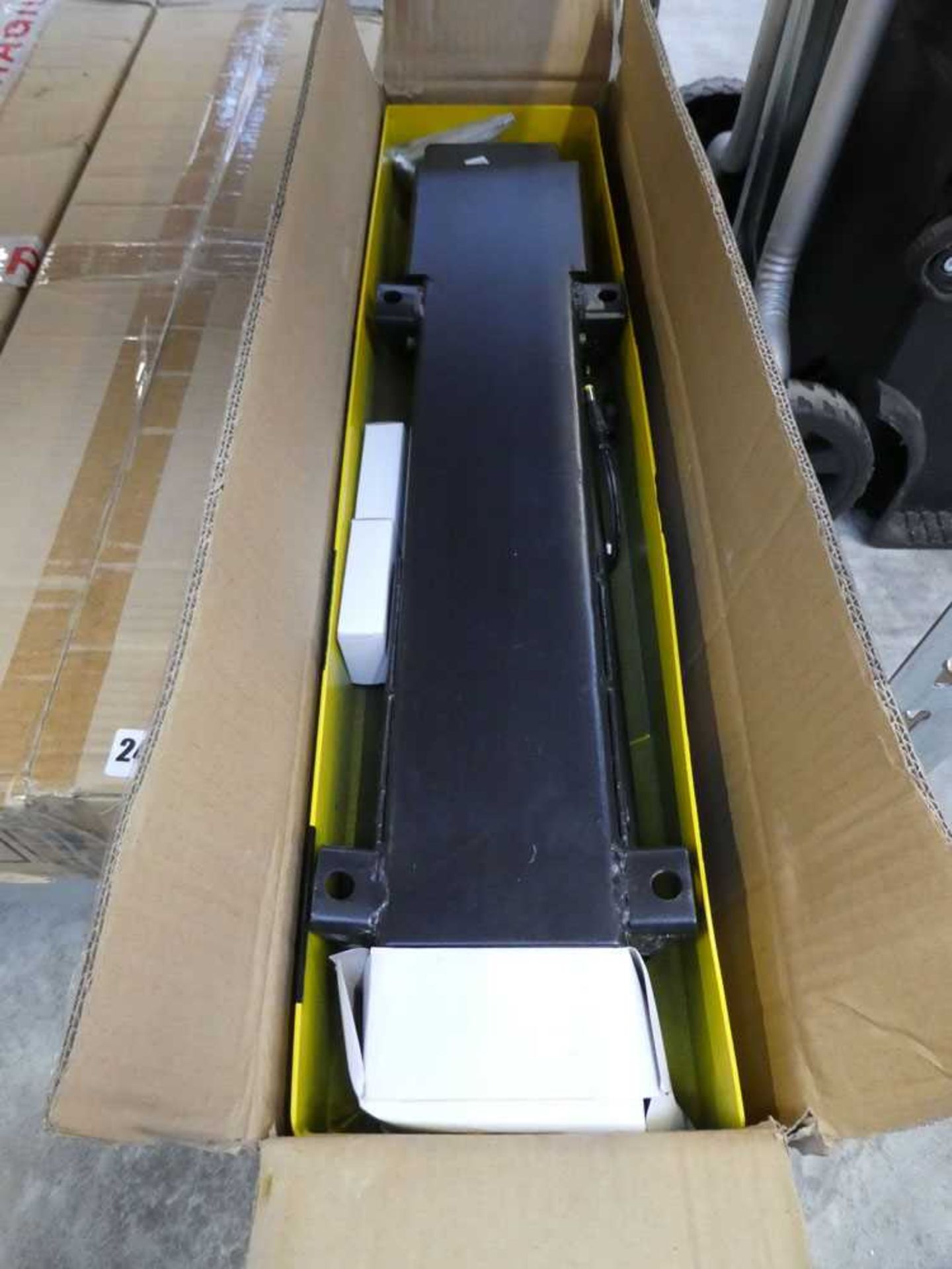 Boxed remote control car parking barrier