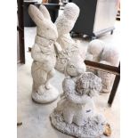 2 concrete garden rabbits