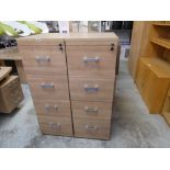 Pair of light walnut effect four drawer filing cabinet with keys