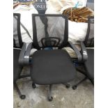Black mesh back padded swivel office armchair on five star base