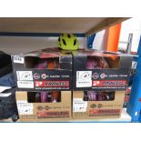 Box containing twelve Prowell branded child bike helmets