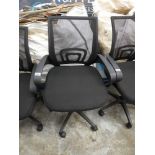 Black mesh back padded swivel office armchair on five star base