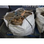 Builder's bag of chopped wood