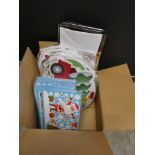 Box containing mixed Christmas items including 29 pack Christmas sheets, Christmas yard stakes for