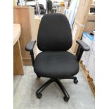 Black cloth swivel office armchair on 5 star base