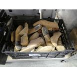 Crate of wooden shoe lasts
