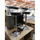 +VAT Pair of chrome and black leatherette height adjustable bar stools