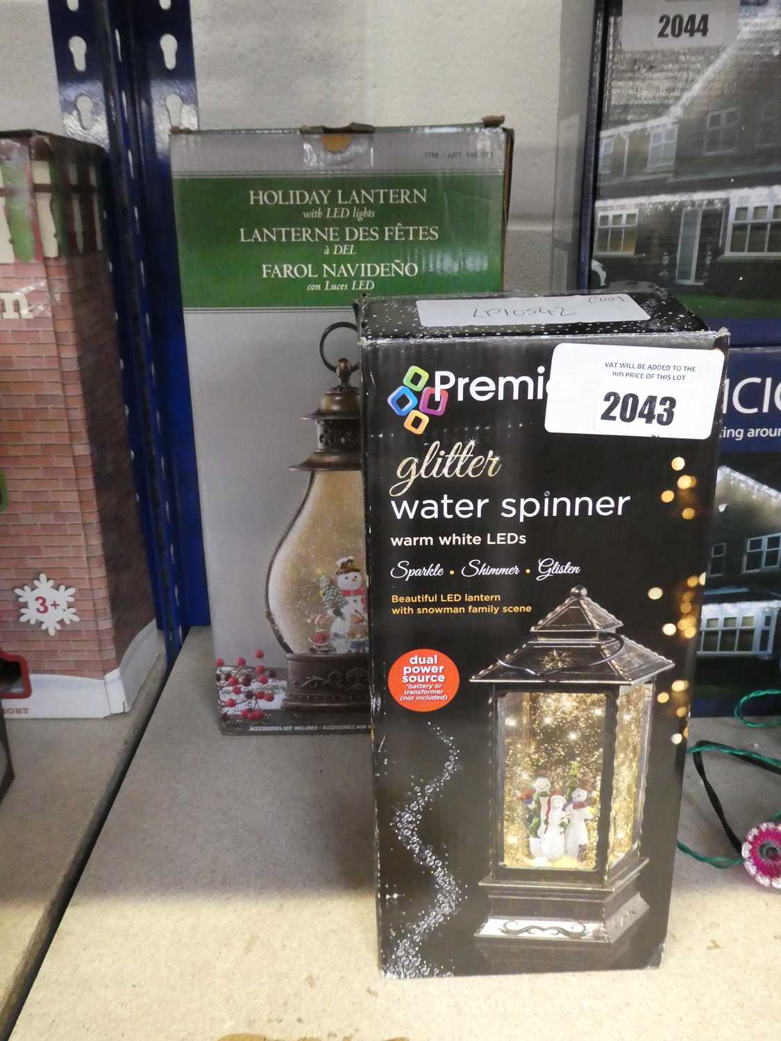 +VAT Boxed Holiday lantern together with one boxed water spinner