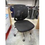 Black cloth swivel office armchair on 5 star chrome base