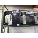 +VAT Three boxed De'Longhi mini filled oil radiators