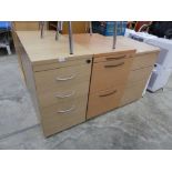 Light oak effect two door cupboard together with three, 3 drawer pedestals