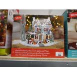 +VAT Boxed Disney animated holiday house with lights and music