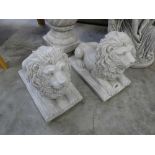 Pair of concrete lying lions