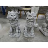 Pair of concrete Chinese guardians