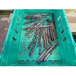 Crate containing a quantity of large heavy duty drill bits