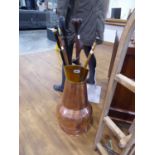 Copper and brass large single handled floor standing jug shaped umbrella stand