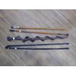 Hand carved serpent walking stick together with 4 further walking sticks and canes