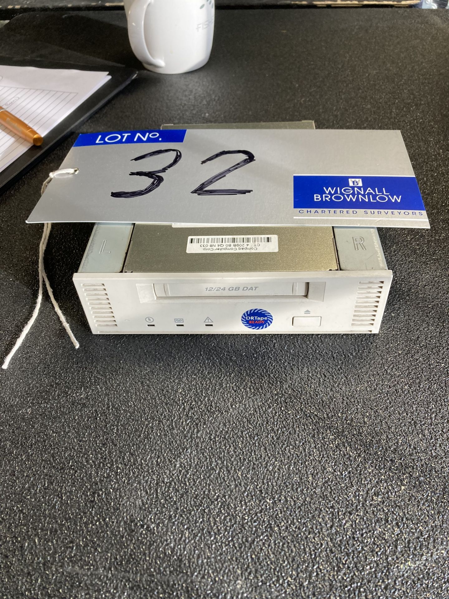 A DAT Digital Storage Device 12/24, sold as seen (located at Dobsons, 17 Deer Park, Road, Wimbledon,