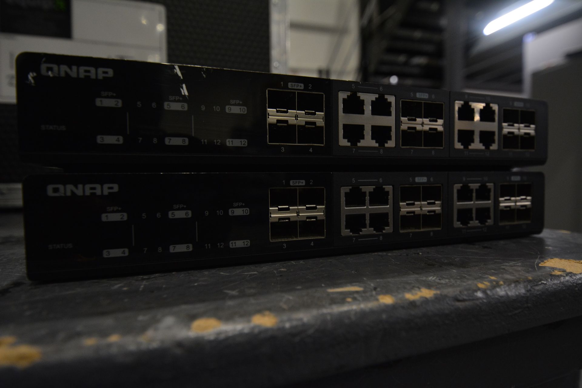 A 12 port QNAP QSW-1208-8C 10GbE Unmanaged Switch (located at equip, 1 Somers Place, Brixton Hill,