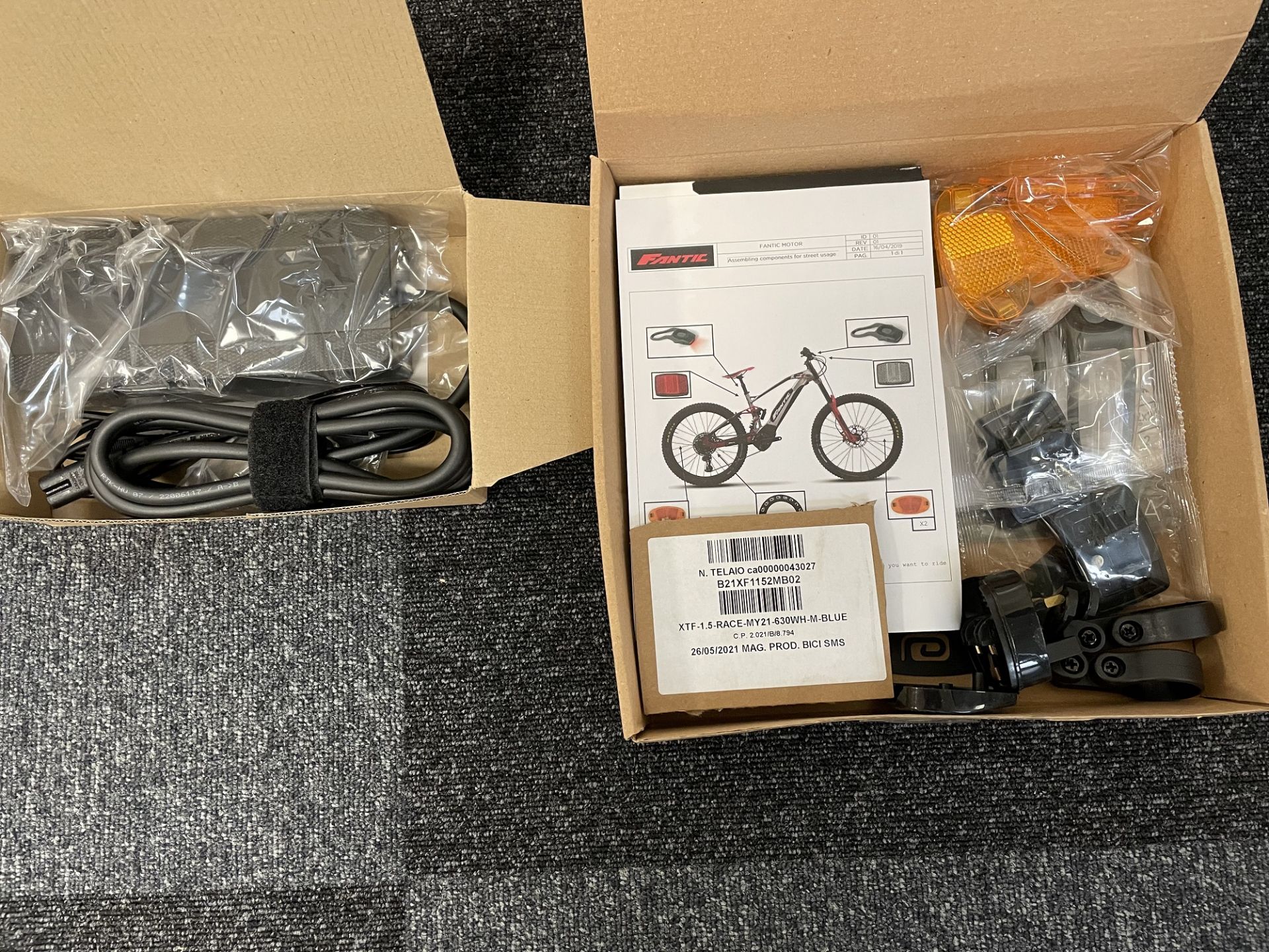 2 Spare Battery Chargers and Accessory Kits for Fantic Electric Bikes.