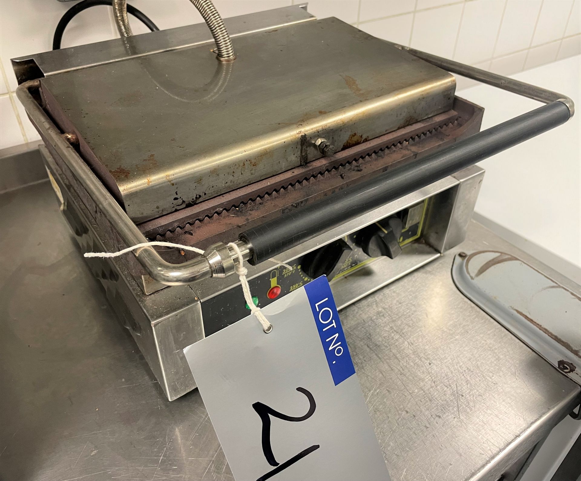 A Roller Grill Panini Machine/Contact Grill.