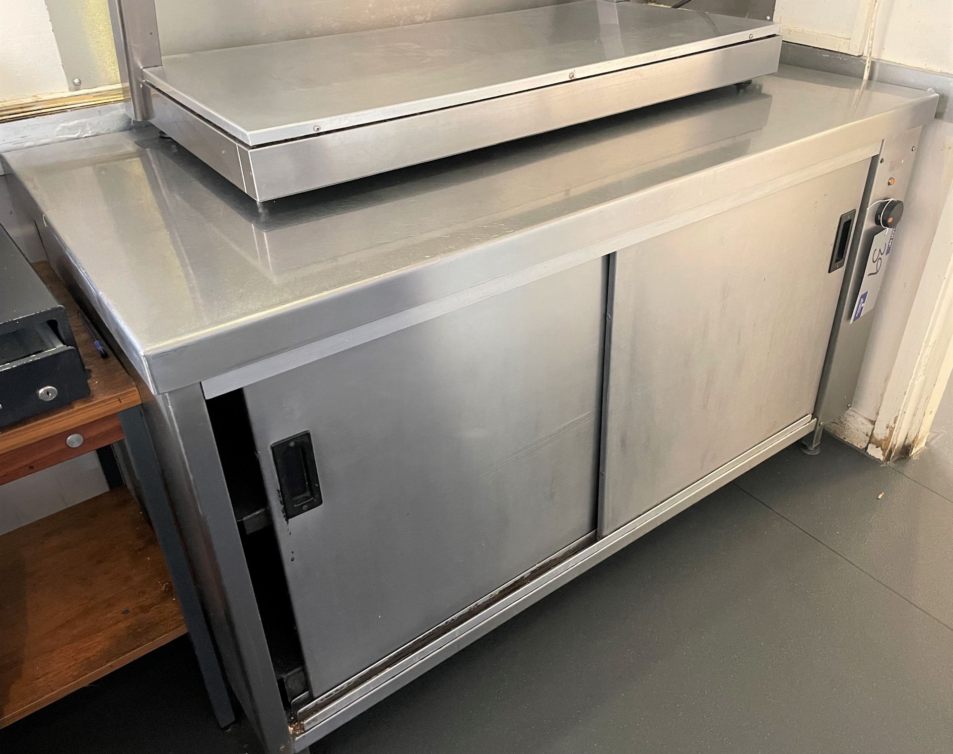 A Stainless Steel Double Door Hot Cupboard, 1500mm x 760mm x 870mm h.