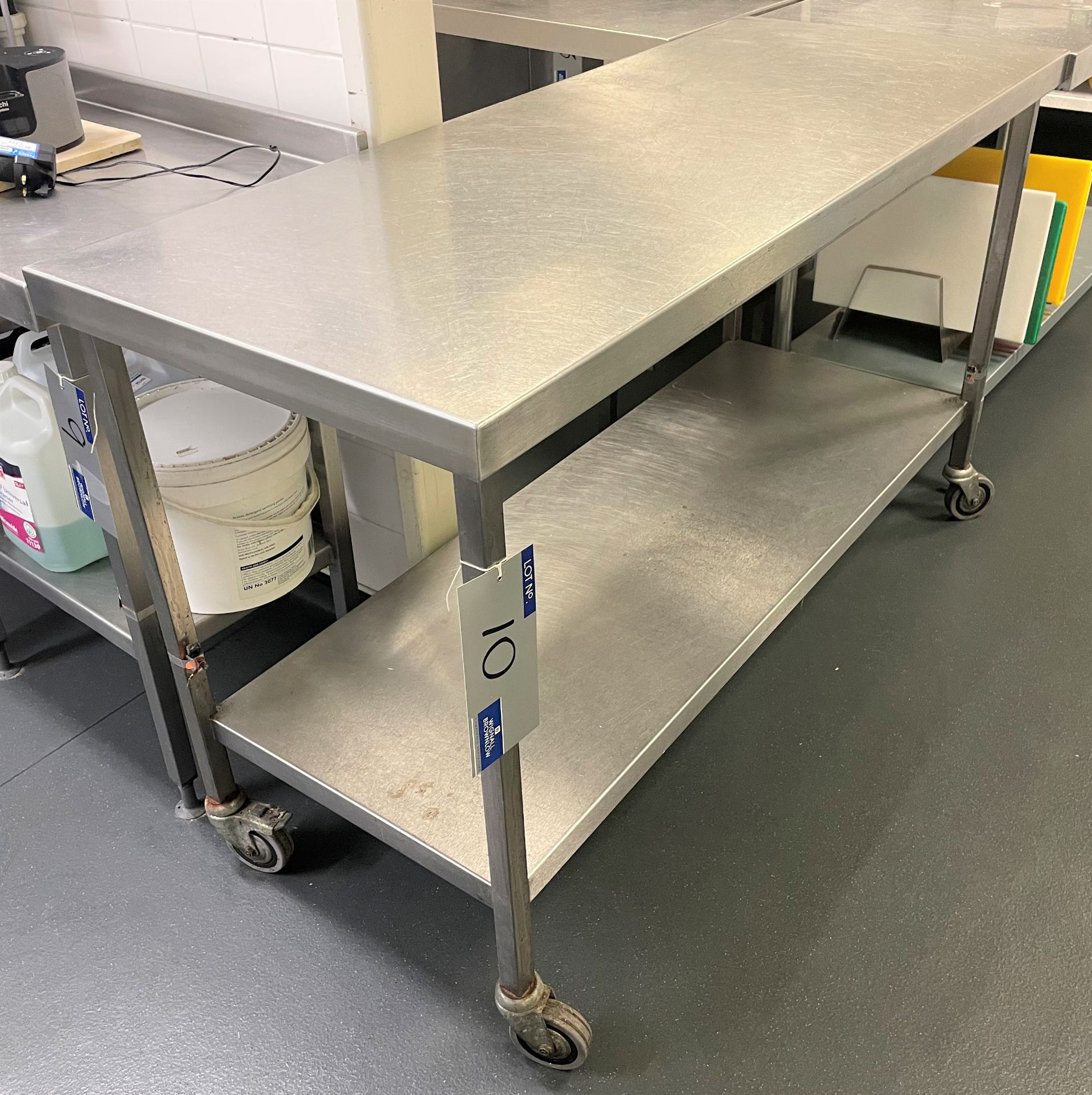 A Mobile Stainless Steel Bench with undershelf, 1500mm x 600mm x 900mm h.