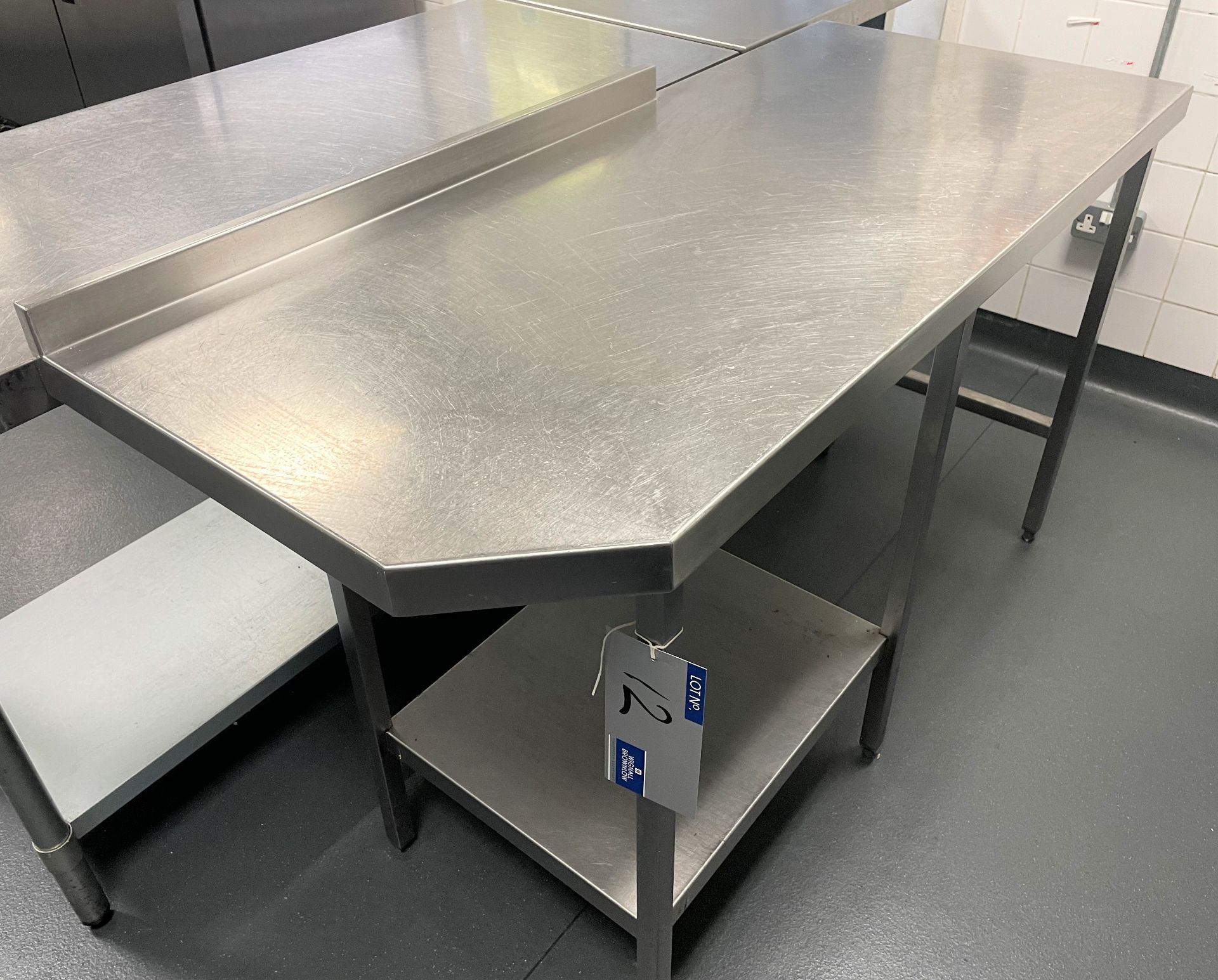 A Stainless Steel Bench with undershelf, 1500mm x 650mm x 900mm h.