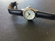 A Limit Quartz Wristwatch with Leather Strap (GS215) A Limit Quartz Wristwatch with a black