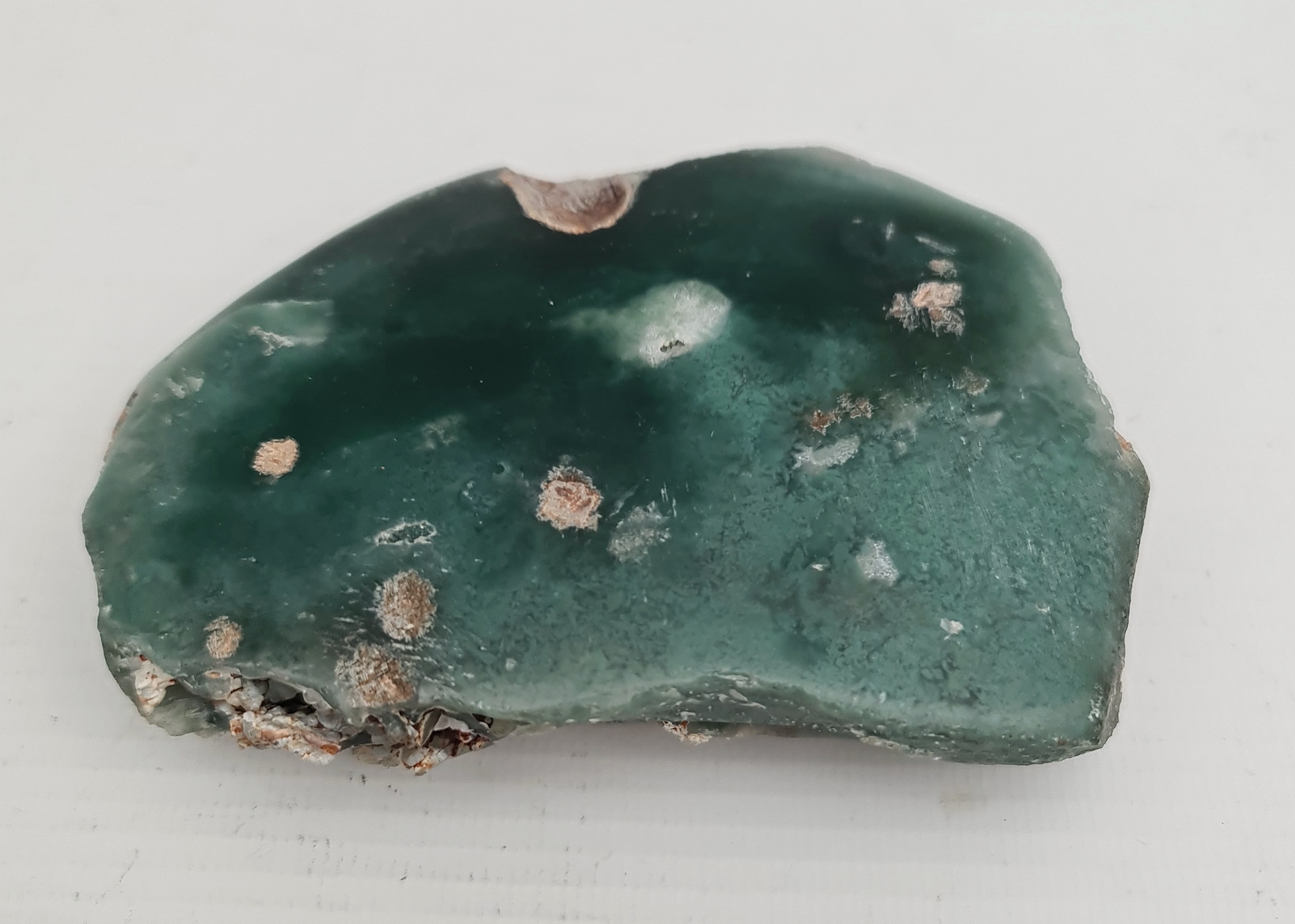 Collectable Minerals Jadeite Weight 312g. Measures 4.5 inches wide by 3.25 inches