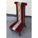 A Victorian Prei Dieu upholstered in red velvet and embroidered runner, ebonised mahogany