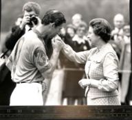 Royalty Queen receives a kiss on the hand from Prince Charles at Smith's Lawn, Windsor in June 19...