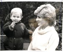 Royalty Lady Diana and Prince William held by his mother in December 1993