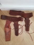 2 Brown Suede Gun Holsters and one leather.