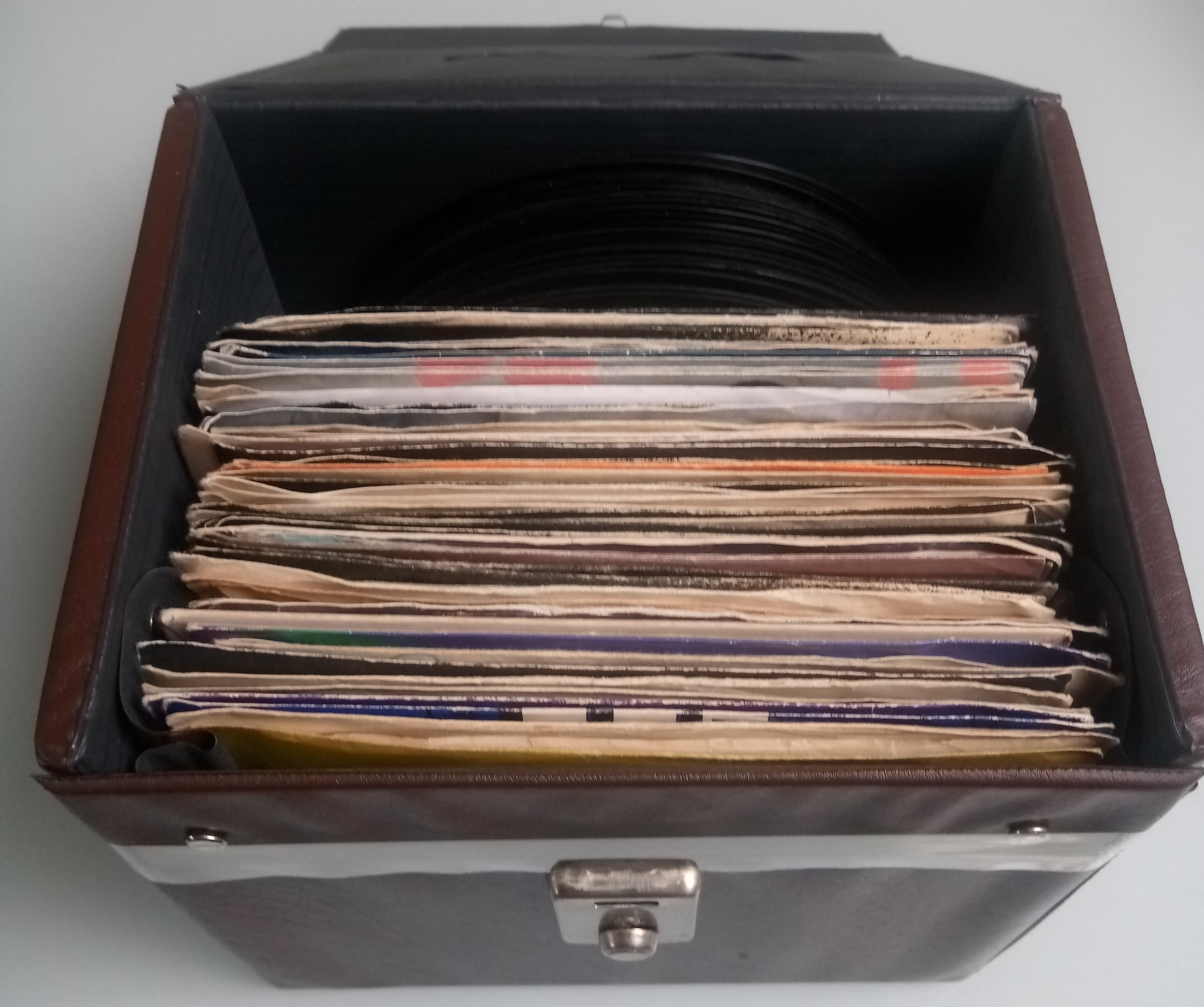 75 x Vinyl Records In Original Retro Case.