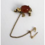 Gold Rhino Form Brooch with Carnelian & Ruby Eyes