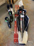 2 pairs of ski boots and poles etc