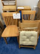 4 wooden folding chairs and 2 side chairs