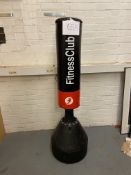 Fitness club punch bag on stand