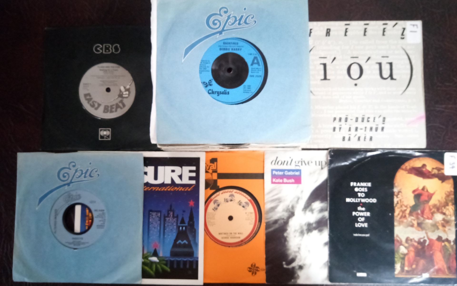 A collection of 50 x vinyl records. Debbie Harry - Frankie goes to hollywood etc.