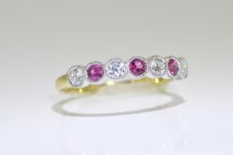 Ruby & Diamond Ring set in 18 carat yellow gold.