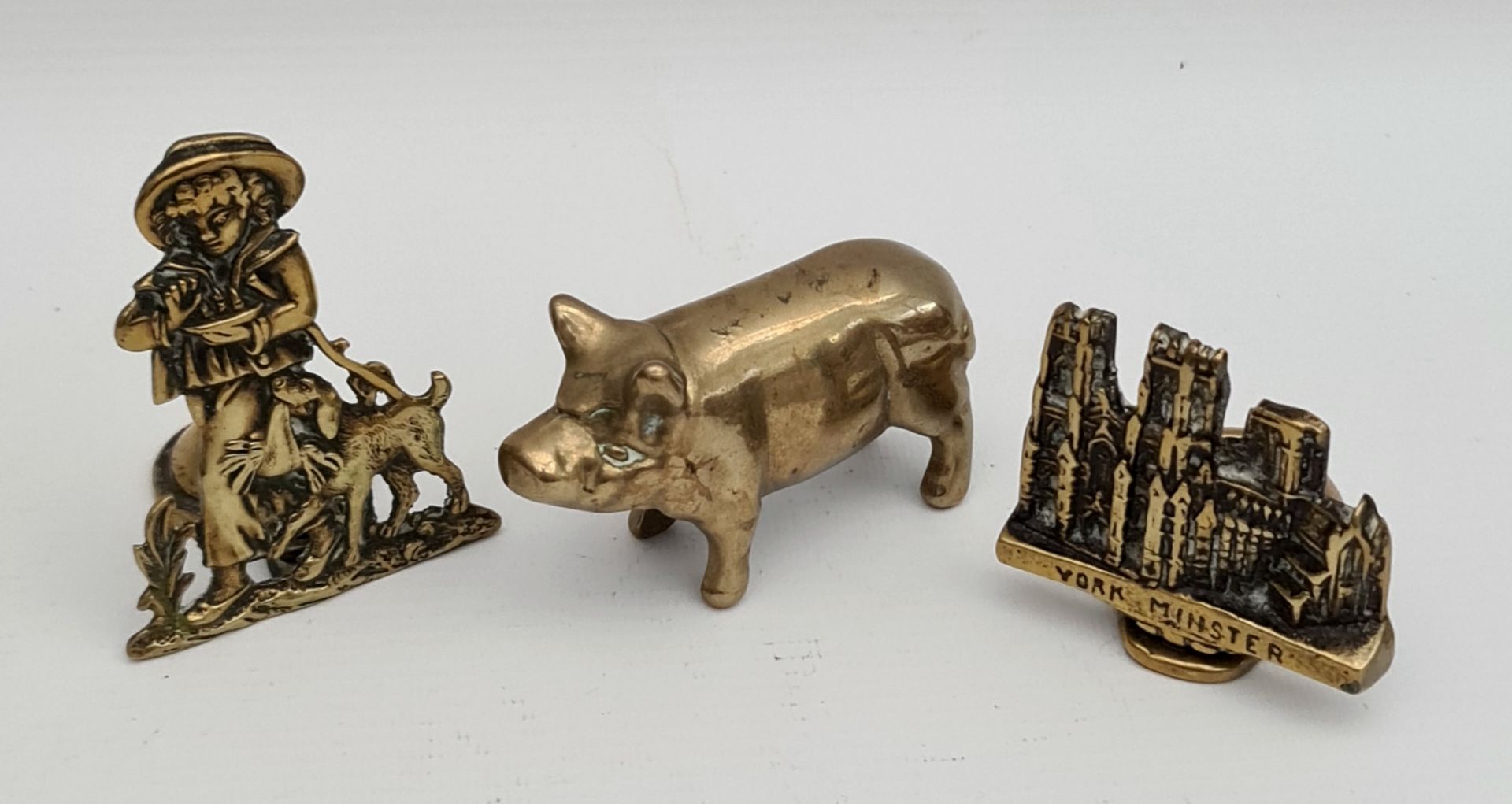 Antique Brass Pig and Candle Holders Rural Scene and York Minster Antique Brass Pig and Candle