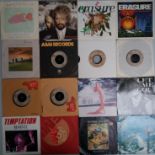 A collection of 33 x vinyl records - The Cure - The Rolling Stones - Inxs.