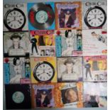 A collection of 30 x Culture club vinyl records and poster version.