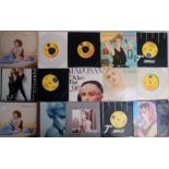 A collection of 24 x Madonna vinyl records.