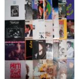 A collection of 75 x vinyl records.