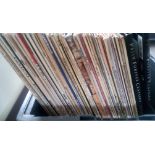 A collection of 52 x vinyl records.