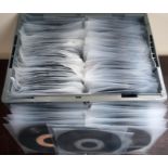 A collection of 250 plus vinyl records in clear protective covers.